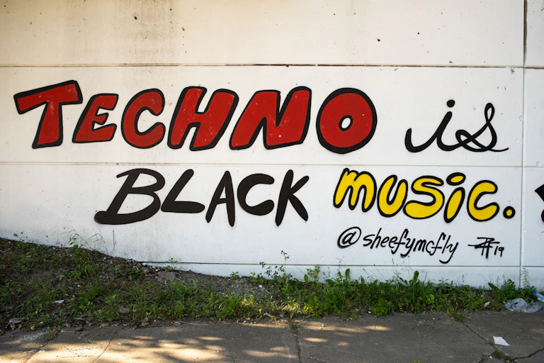 Grafitti on a wall reads 'Techno is Black music.'
