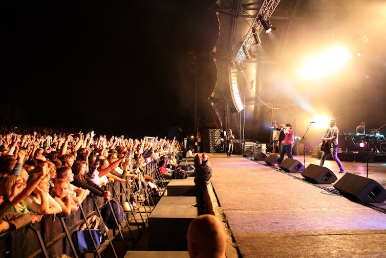 Audience and performers at a Hillsong concert