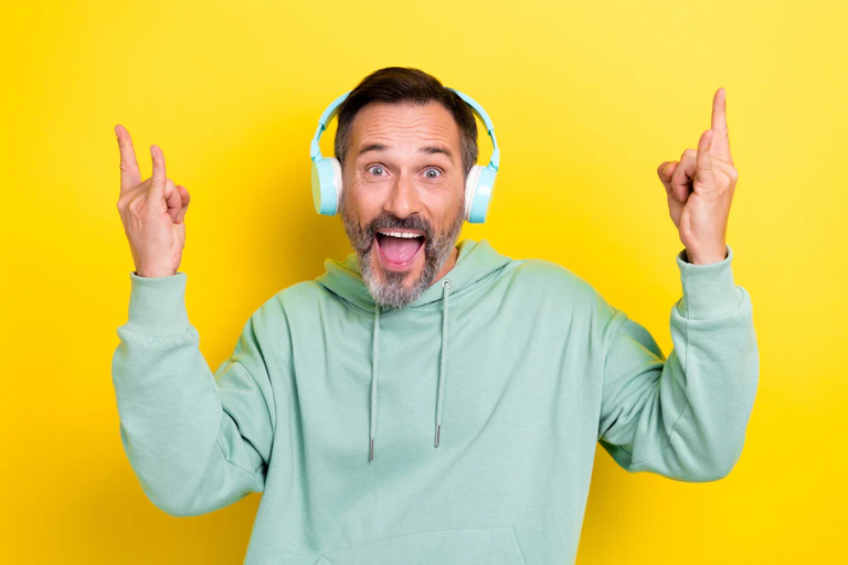 Middle aged man with headphones on
