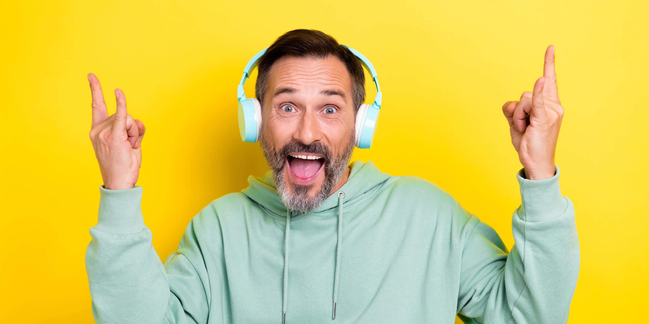Middle aged man with headphones on