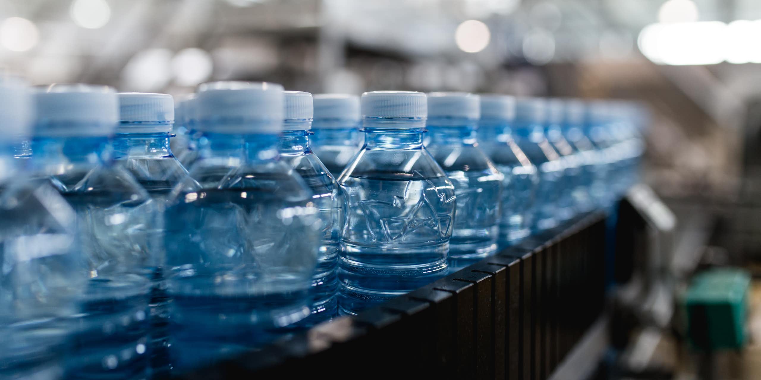 Plastic bottles on an assembly line.