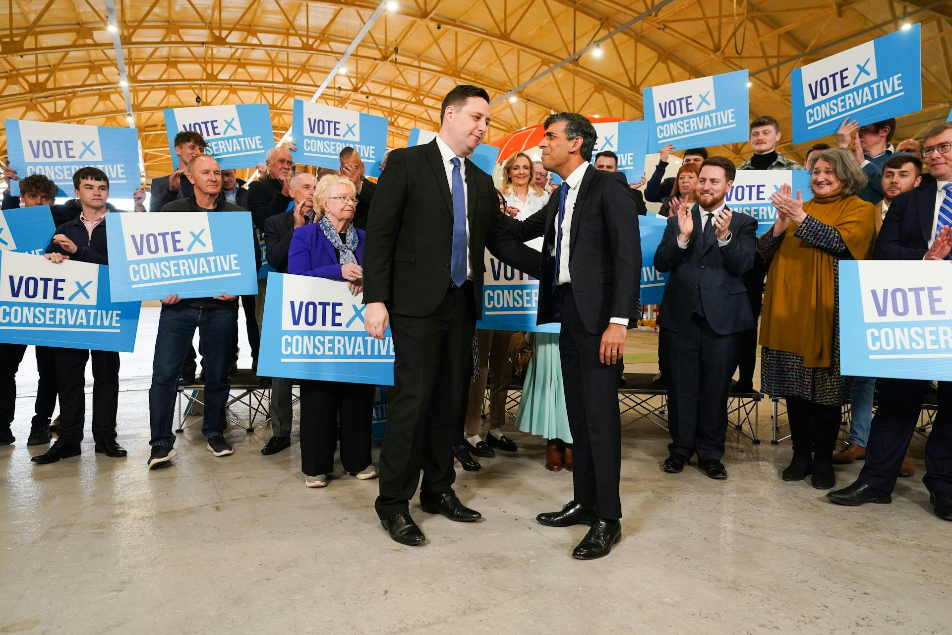 Ben Houchen and Rishi Sunak in front of supporters.
