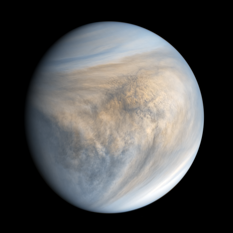 Venus with visible clouds on its surface, photographed with UV light.