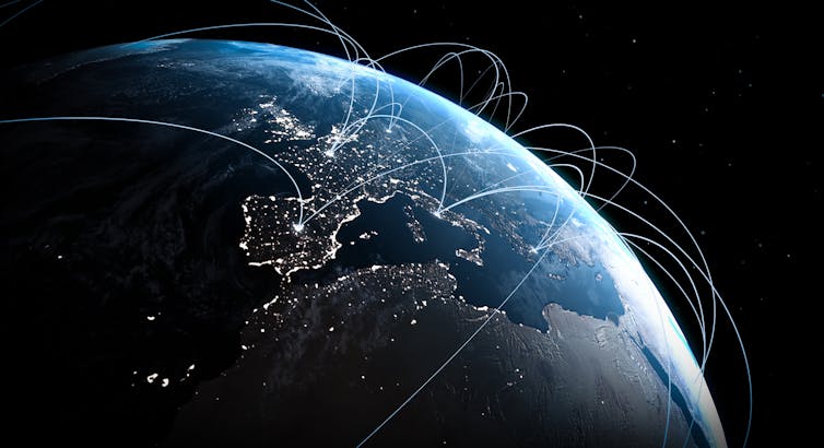 从太空看地球的一部分，显示连接城市的飞行路径等线条