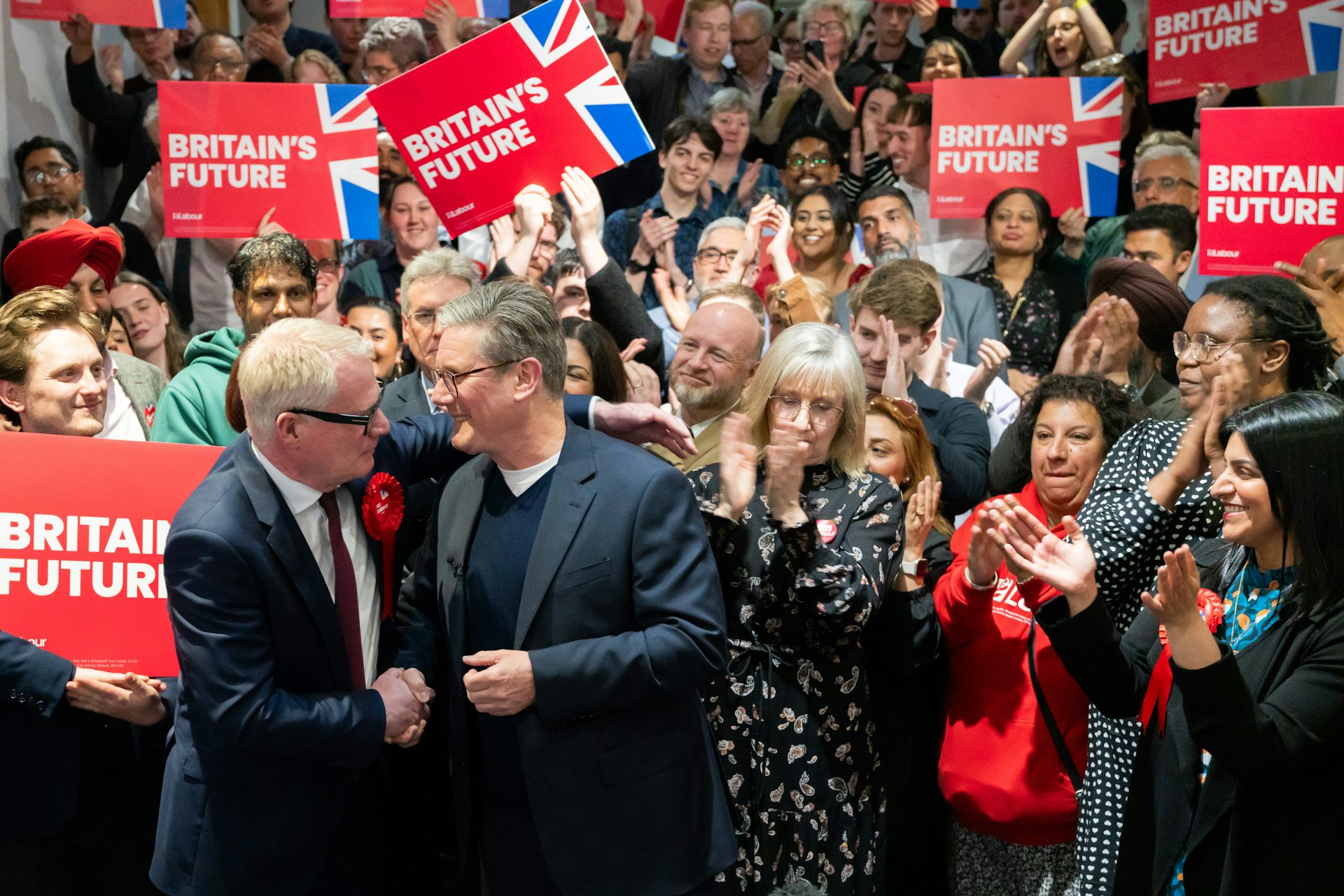 Keir Starmer and Birmingham's new mayor Richard Parker celebrate his election.