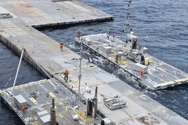 The floating pier being built by US troops off the coast of Gaza, April 2024.