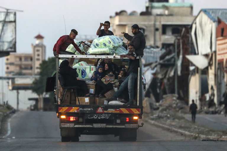 Palestinians fleeing Rafah in southern Gaza ahead of a possible IDF offensive.