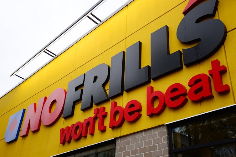 A close-up of the front of a No Frills store