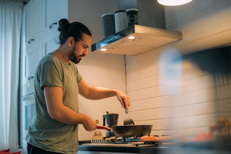 Man cooks