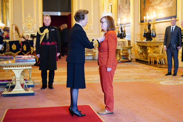 Professor Dame Sarah Gilbert being made a Dame Commander of the British Empire by the Princess Royal at Windsor