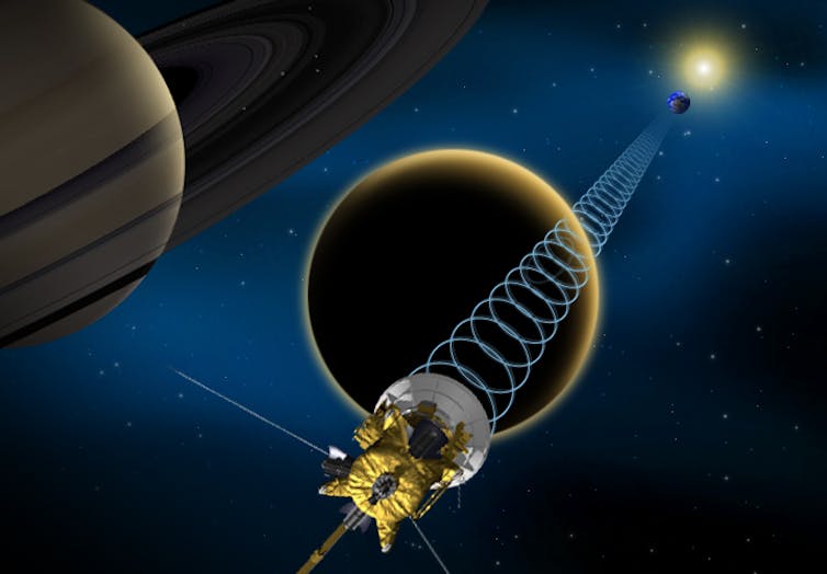 Impression of Cassini flying past Saturn.