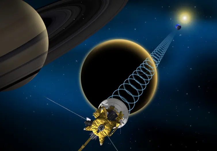 Impression of Cassini flying past Saturn.