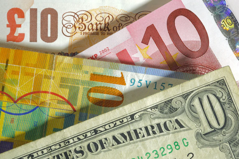 Assorted banknotes from the US, UK, and Europe
