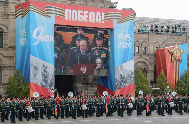 Vladimir Putin delivers his Victory Day speech via video screen in Red Square, Moscow, on May 9 2024
