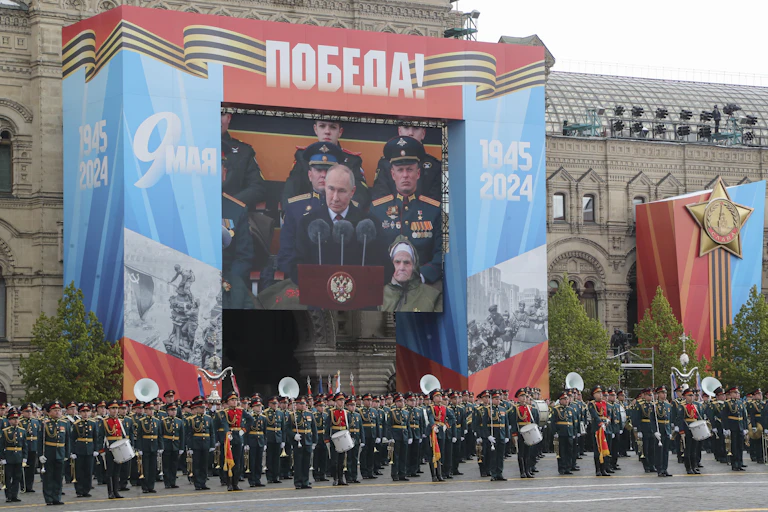 Vladimir Putin delivers his Victory Day speech via video screen in Red Square, Moscow, on May 9 2024