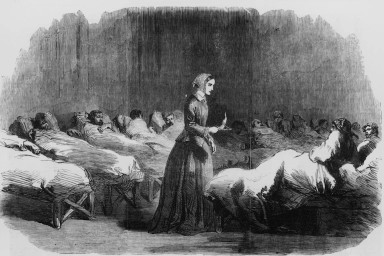 Illustration of English nurse Florence Nightingale overseeing patients lying in beds in a hospital.