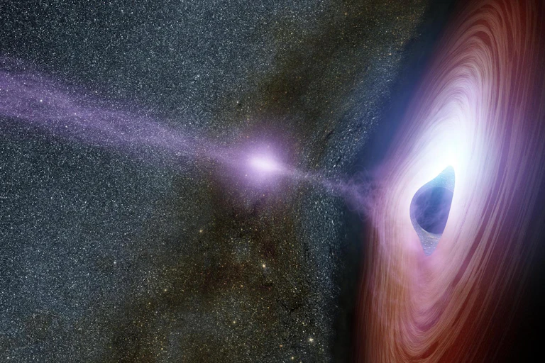 An illustration of a supermassive black hole with a swirling disk of material moving into its spherical center.