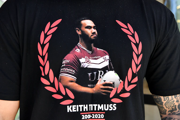 Family and friends wear t-shirts in memory of Keith Titmuss.