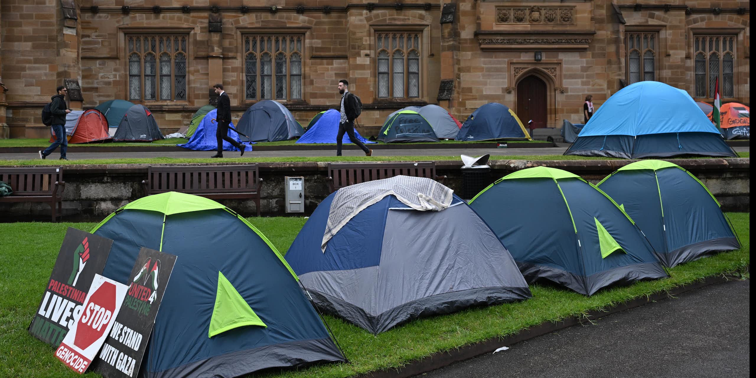 A row of tends outside the Main Quadrangle building at Sydney University. 
