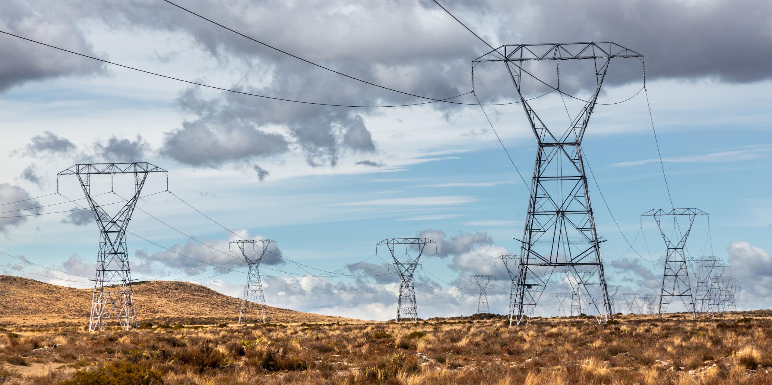 Overhead power lines run through the Rangipo Desert in Tongariro National Park, on the North Island of New Zealand.