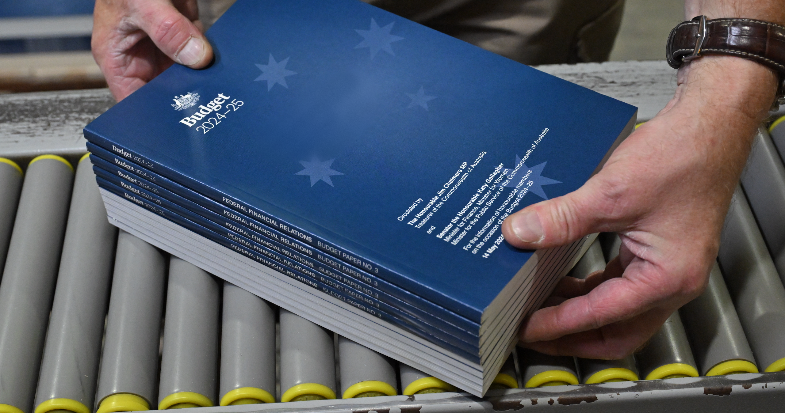 The 2024-2025 Budget Papers are seen at a printing facility prior to being delivered to Parliament House