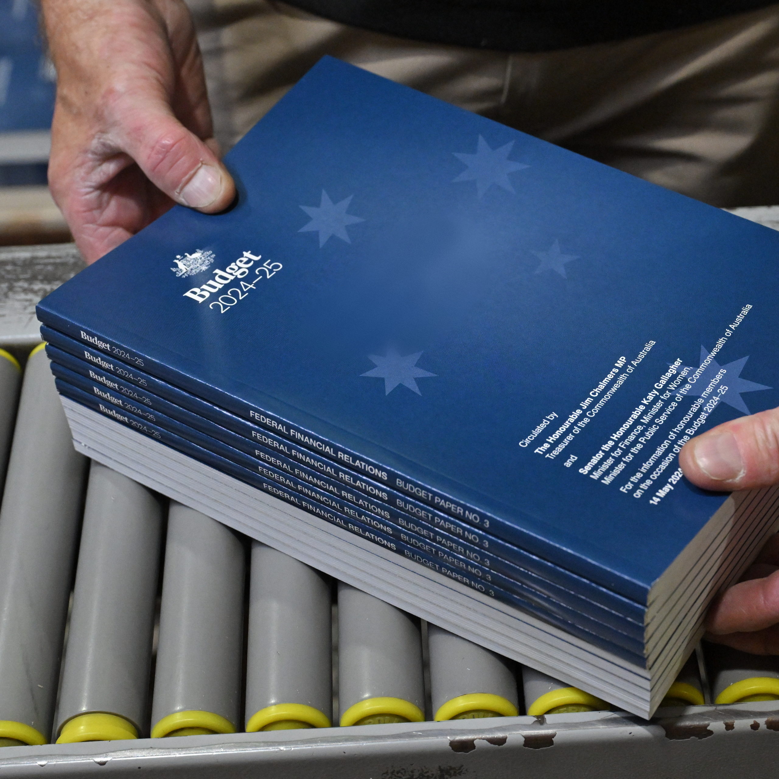 The 2024-2025 Budget Papers are seen at a printing facility prior to being delivered to Parliament House