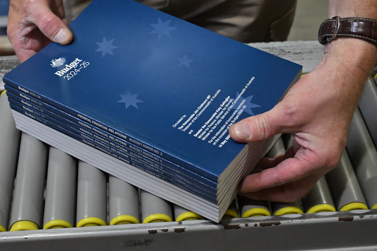 The 2024-2025 Budget Papers are seen at a printing facility prior to being delivered to Parliament House
