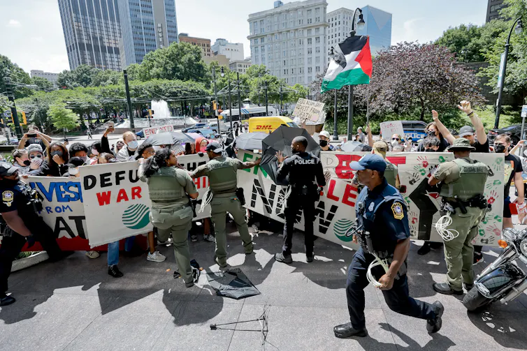 Police block a pro-Palestinian march in Atlanta.