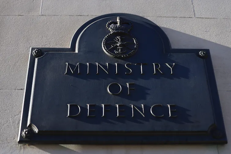A photo of the UK's Ministry of Defence sign outside its building in London, UK.