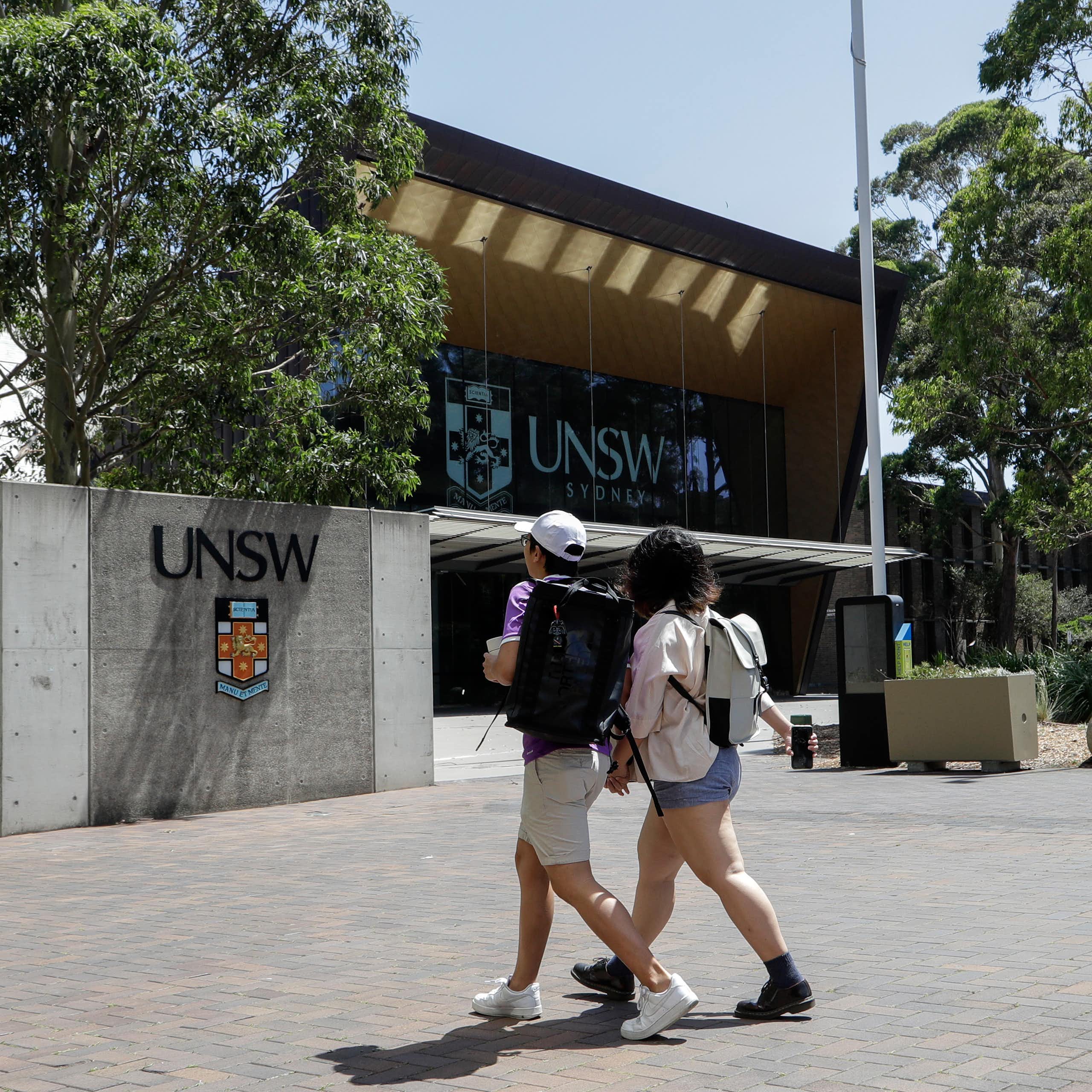 Students walk around a campus in Sydney.