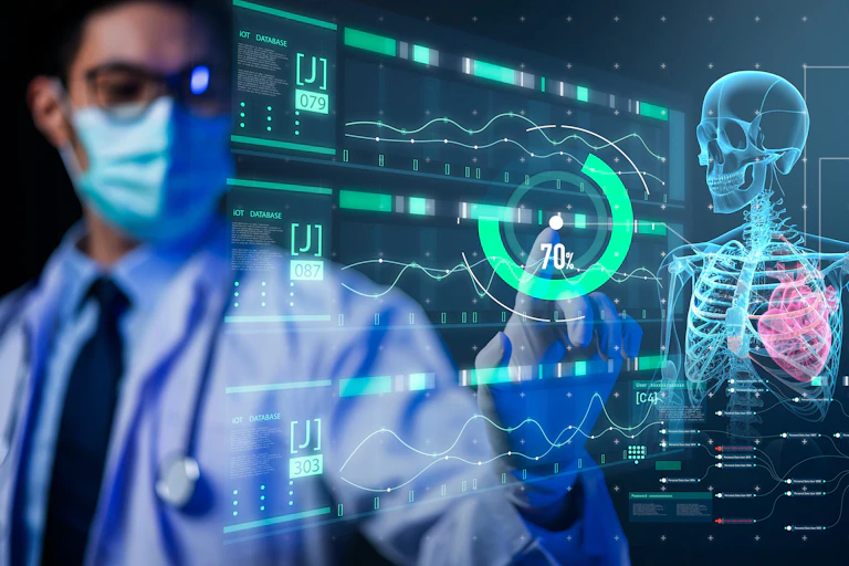 A doctor looking at a computer screen with a simulation of a skeleton on it and various metrics