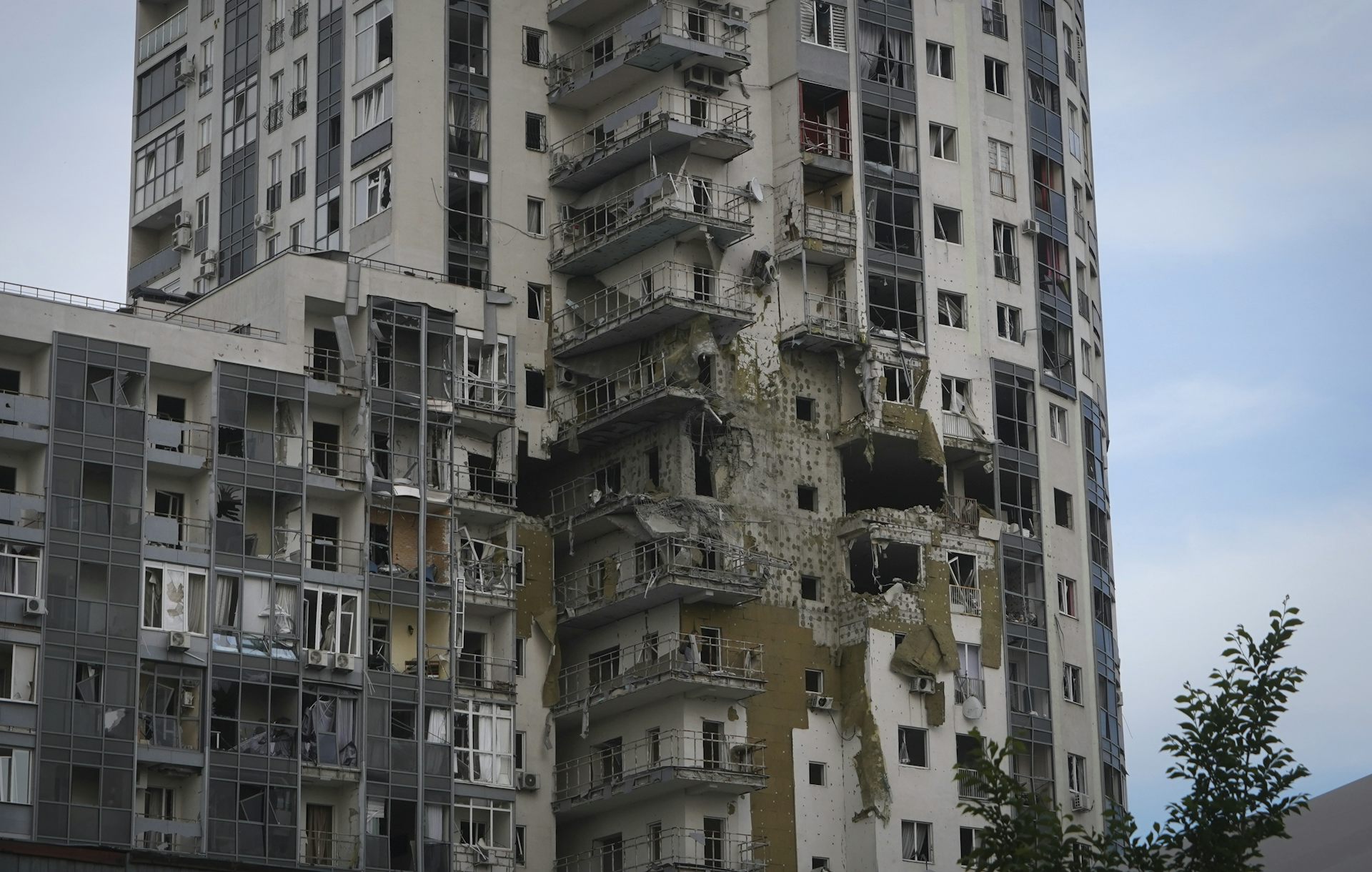 A partially destroyed apartment building.