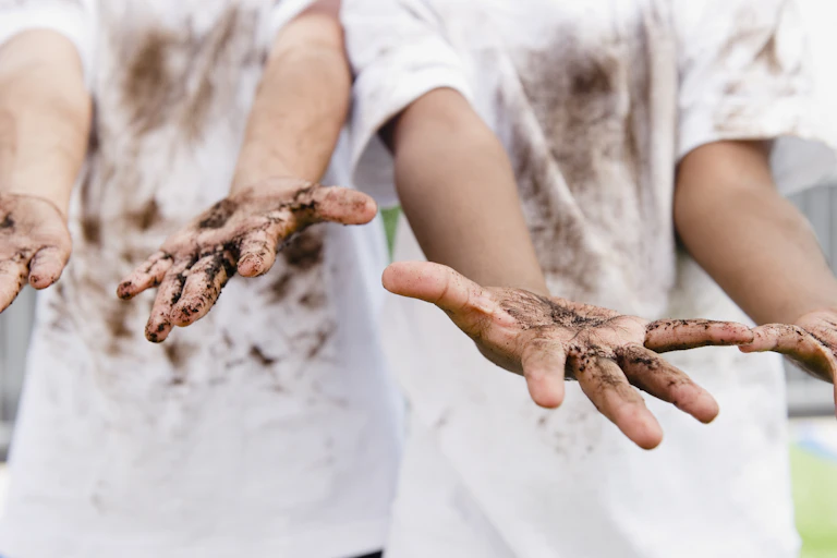 Children display dirty hands