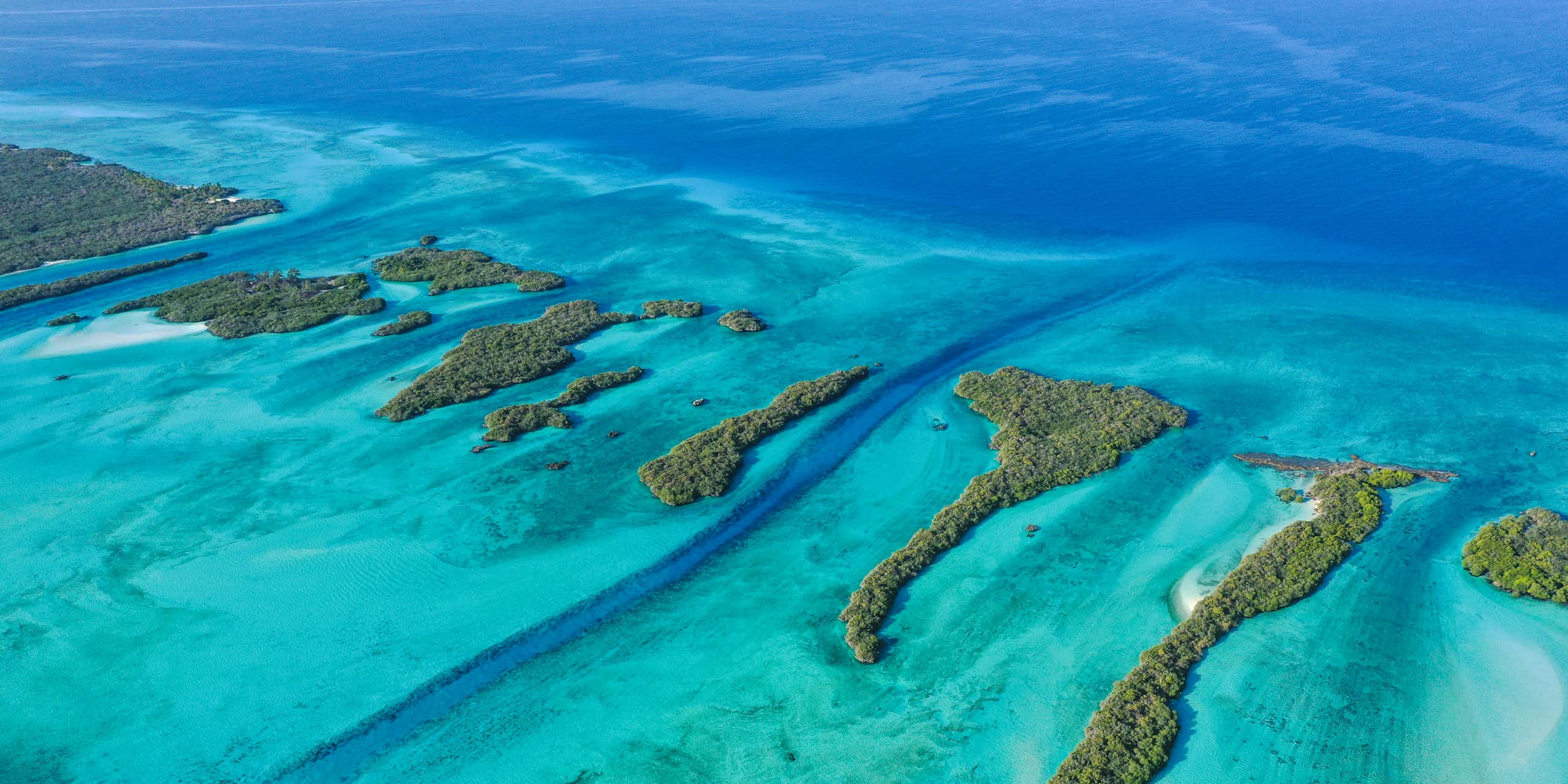 Aerial view of small islands in the ocean.