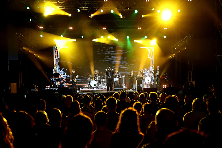 A crowd watches a band.