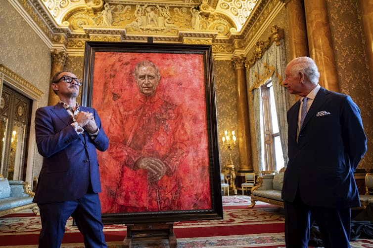 Two men and a painting.