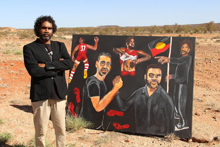A man and a painting.
