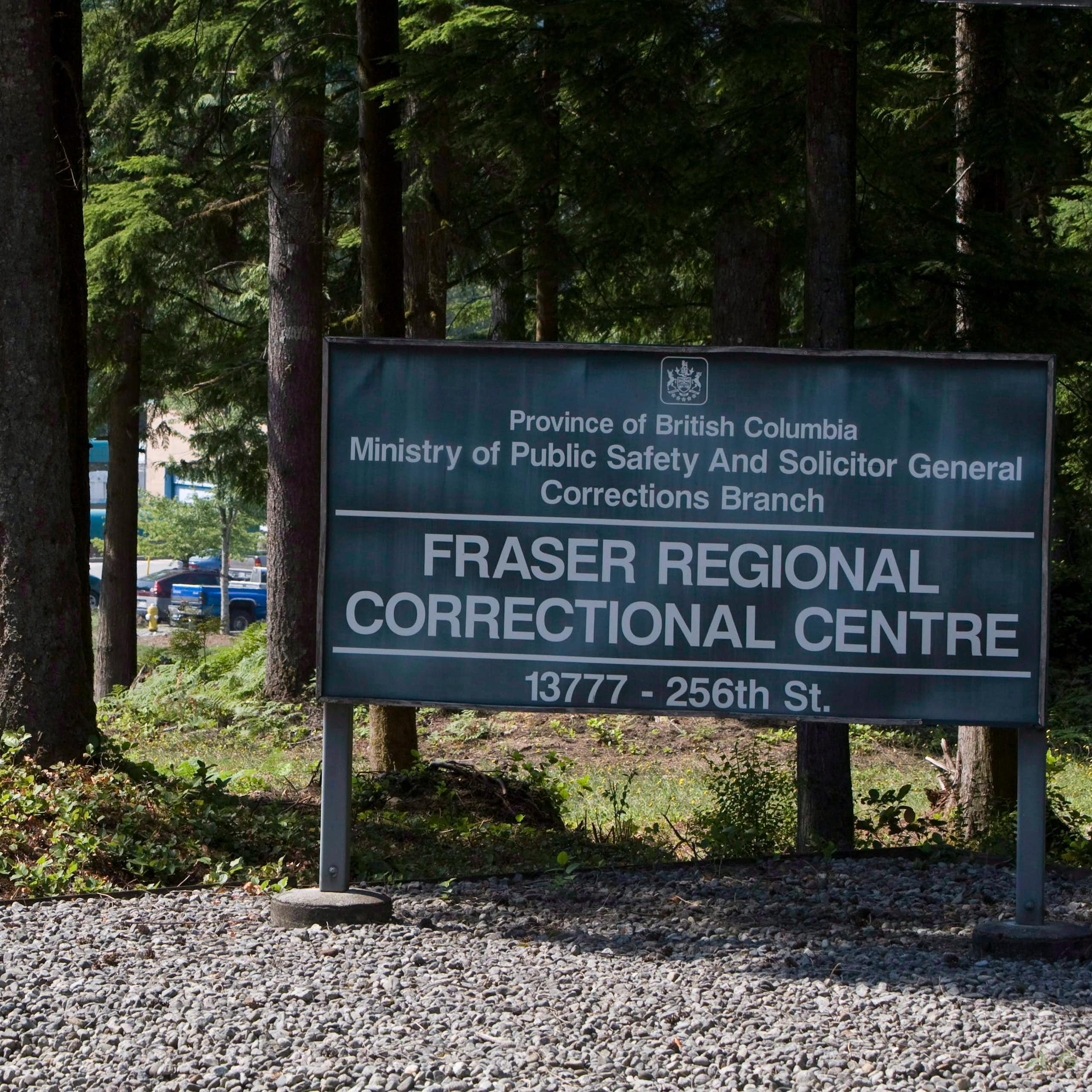 A sign in a wooded area reading" fraser regional correctional centre 