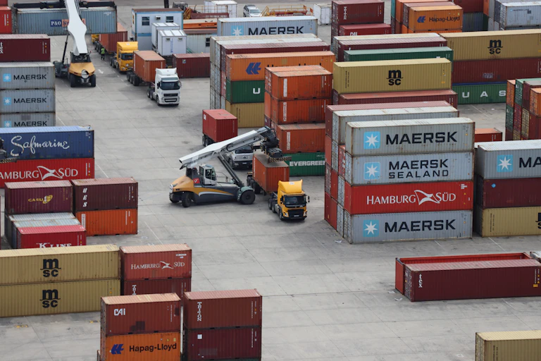 Aerial photo of trucks waiting have their containers offloaded at the Durban port