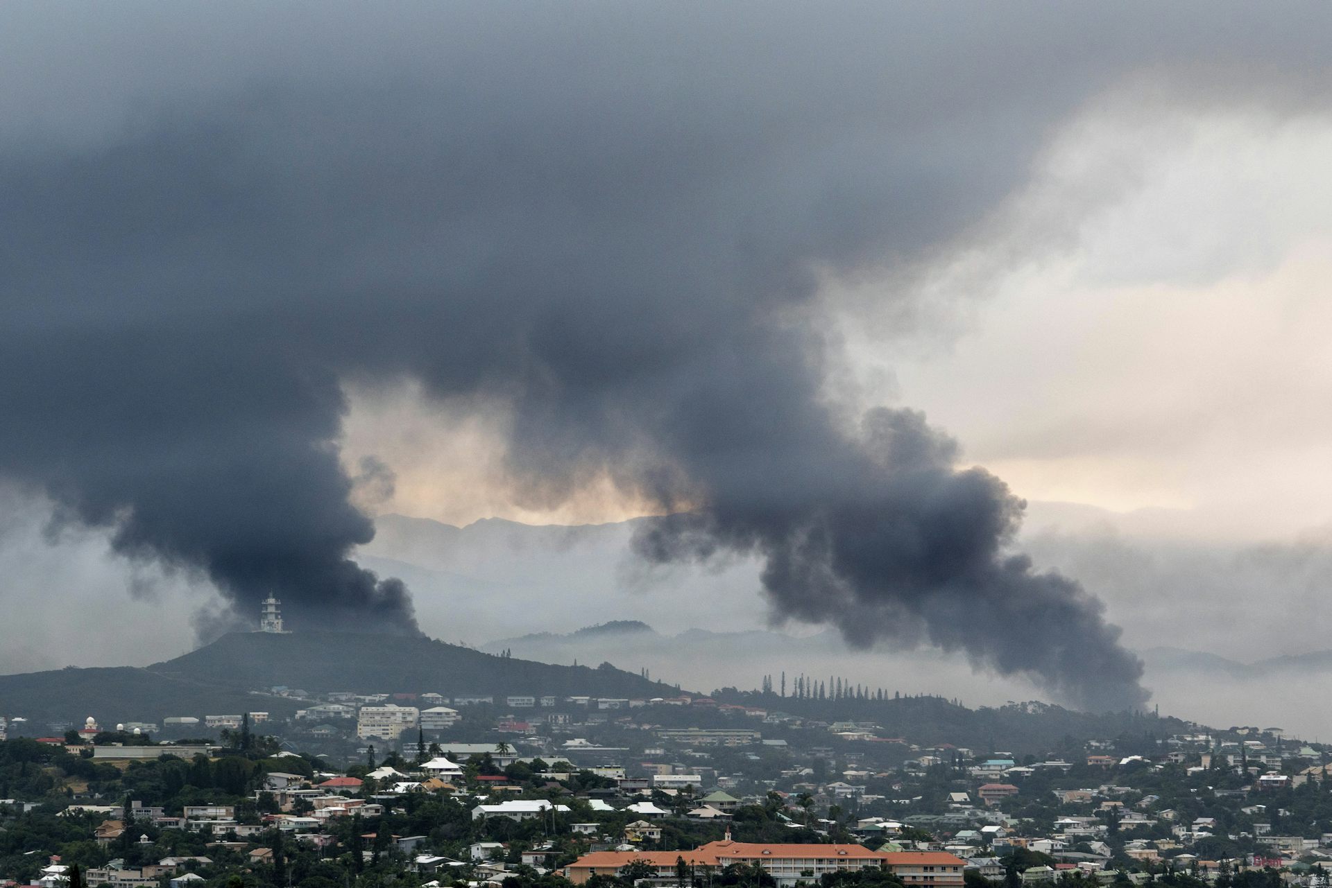 Smoke rising over Noumea.
