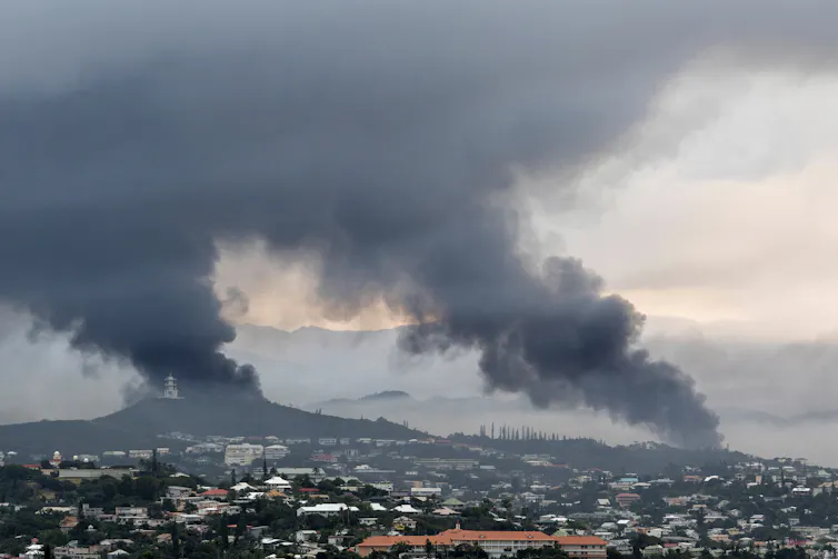 Smoke rising over Noumea.