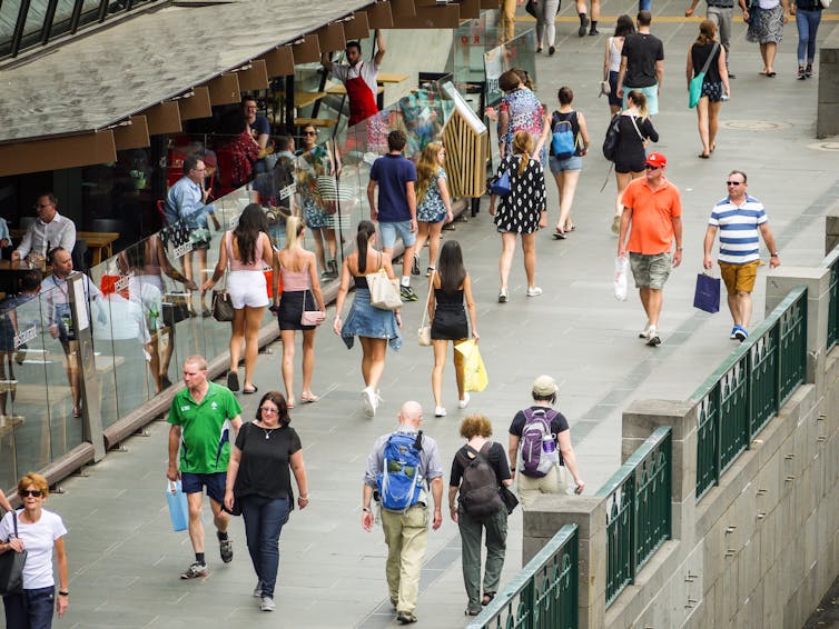 People walking on a wide path