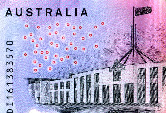 closeup of Australian Parliament House on a $5 note