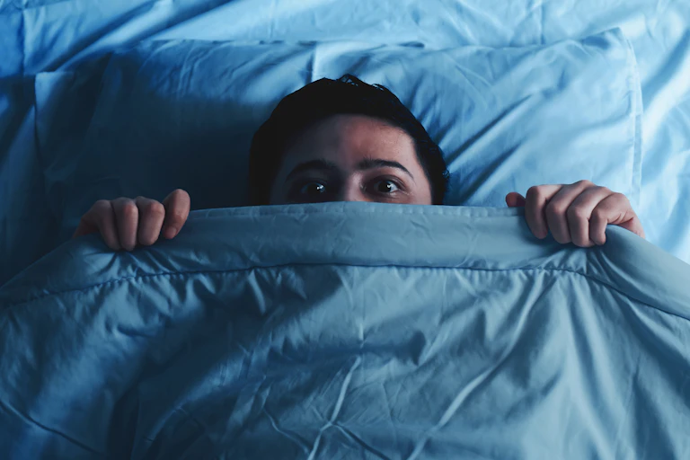 A person waking from a nightmare