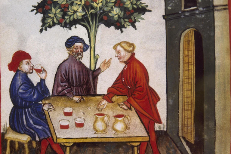 Three men drinking and chatting