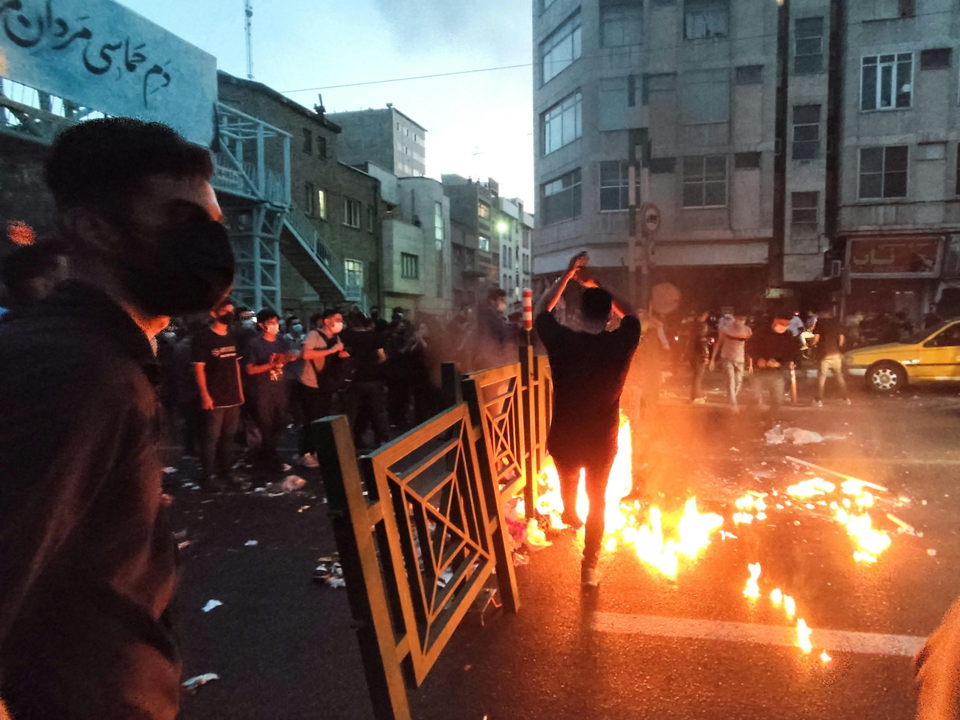 Protesters clash with police in Tehran, 2022.