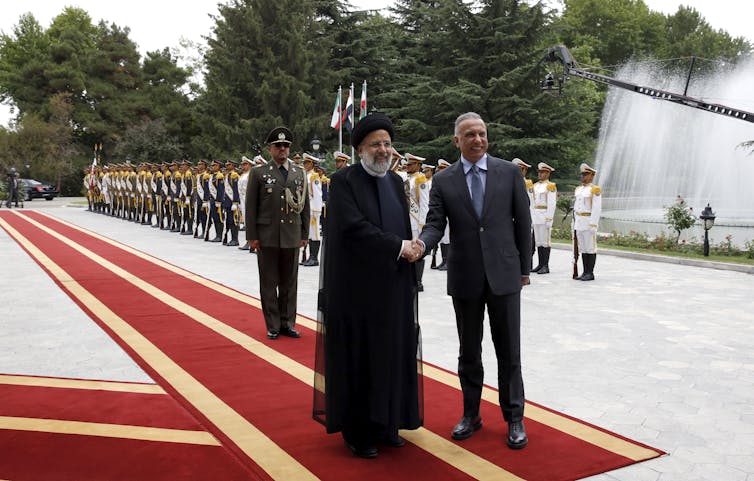 Iranian President Ebrahim Raisi and Iraqi Prime Minister Mustafa Al-Kadhimi.