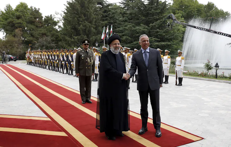 Iranian President Ebrahim Raisi and Iraqi Prime Minister Mustafa Al-Kadhimi.