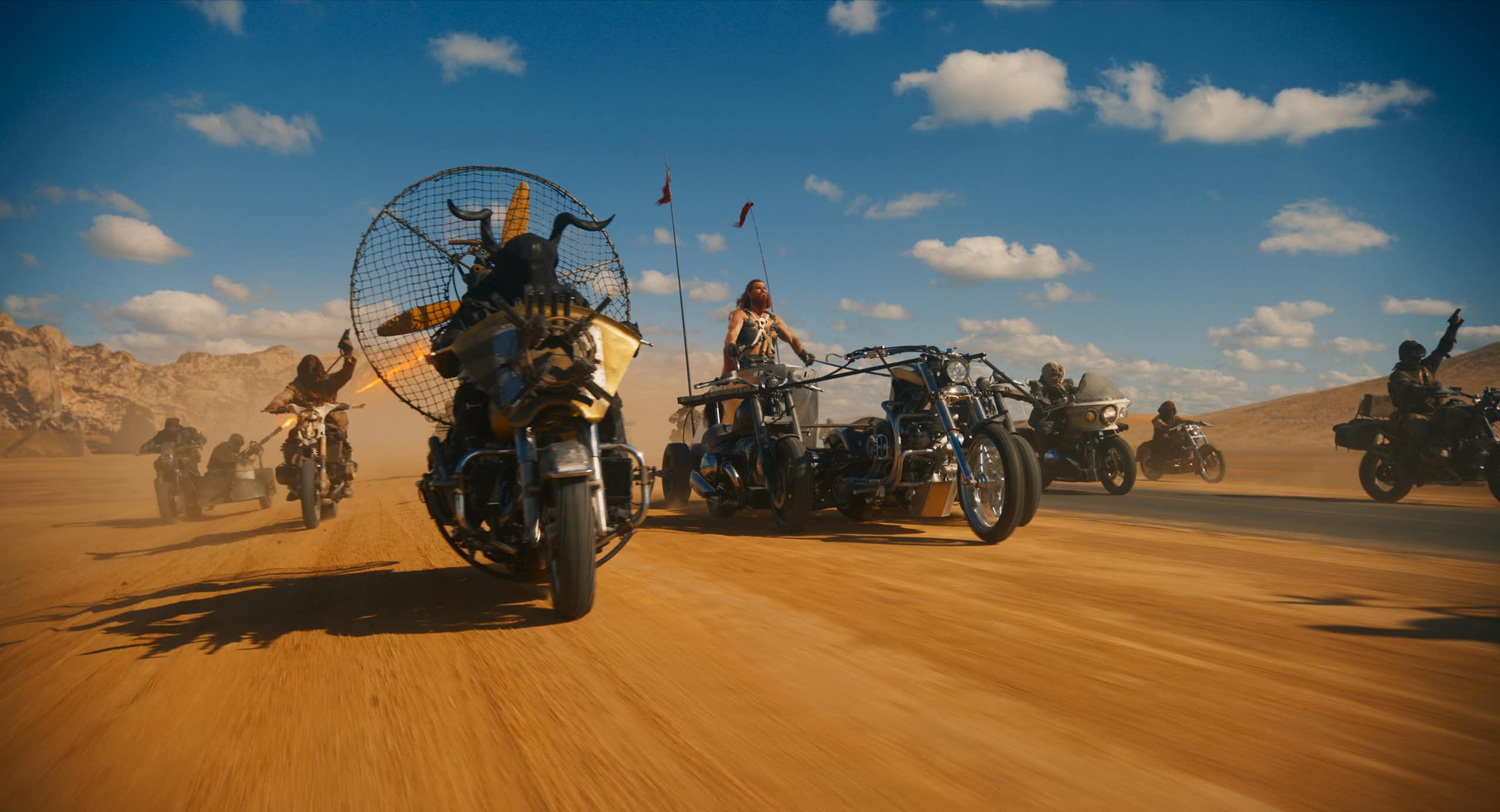 Production image: motorbikes in a desert.