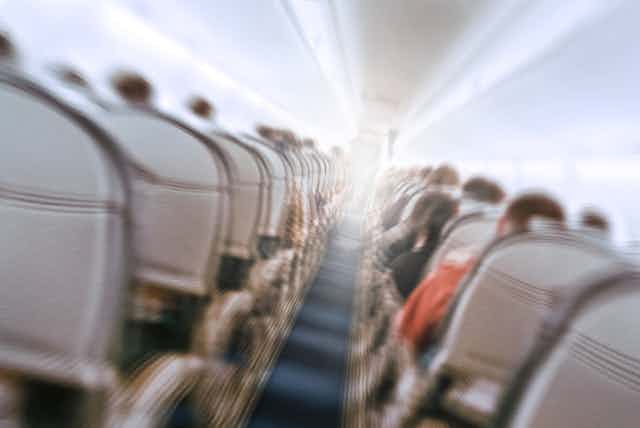 Shaky, blurred image of inside of plane